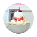 vanilla ice cream bowl with strawberry topping
